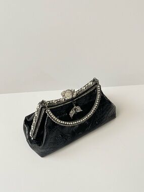 Vintage Besso black embossed clutch